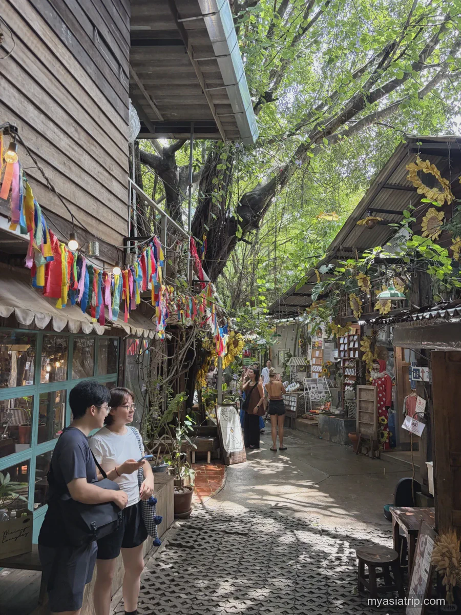 Pedestrian lane with cafes and shops at One Nimman in Chiang Mai