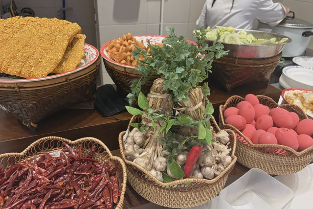 Baskets of fresh produce at a Chiang Mai market