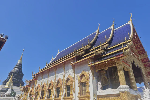 Ornate roof and gilded details at Wat Phra Singh in Chiang Mai